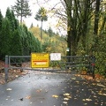 Gray gate at the trailhead for Fire Lane 3 in Portland, Oregon.