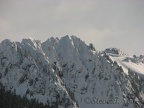 The cold peaks of the western end of the Tatoosh Range look like icy fists punching into the sky.