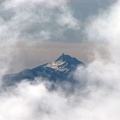Mt. Jefferson appears as a phantom in the mist from Timberline Lodge.