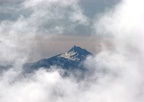 Mt. Jefferson appears as a phantom in the mist from Timberline Lodge.