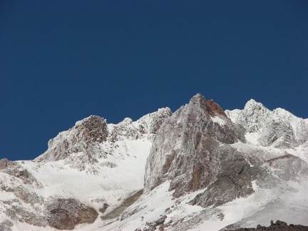 The cobalt-blue sky above Mt. Hood shows the ruggedness of Mt. Hood.