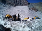 Climbers try to settle in before the big push for the summit just a few hours ahead.