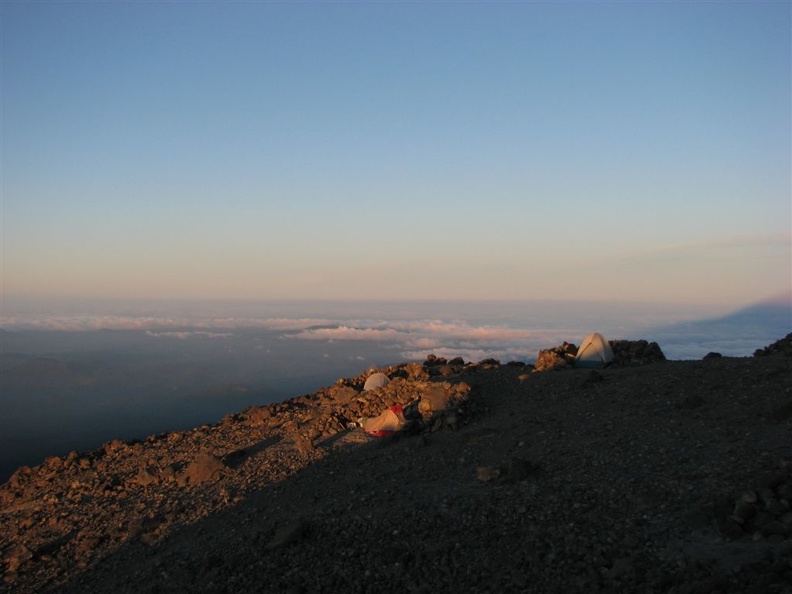 Sunrise from Lunch Counter on Mt. Adams at the 9,500 foot level with the sun just beginning to shine on our tents and warm things up.