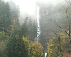 Multnomah Falls cascades hundreds of feet down a sheer cliff into a plunge pool, then over another waterfall.