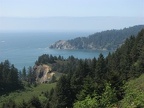 The Neahkahnie Mountain Trail switchbacks up from Highway US 101 and climbs up through an open meadow. This is looking north to Cape Falcon in the far distance.