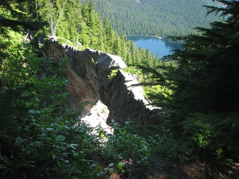 Natural Bridge is a 200 foot wide stone arch. The top is  about five feet wide. Some people climb out onto it, a foolhardy act in the backcountry, in my opinion.