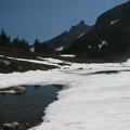 The small lake at Windy Gap is just melting out in mid-July. We filtered water here for the trip down to the Carbon River.