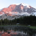 Mt. Rainier at sunset near the saddle between Moraine Park and Mystic Lake. The pond is full of snowmelt and the pond dries up quite a bit during the summer.