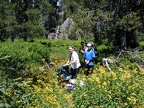 Taking a break along the trail. There are plenty of wildflowers along the trail.