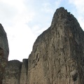 A massive rock towers over the upper falls of Palouse River.