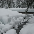 The 3rd bridge over the river. The snow must weigh a few tons on the bridge.