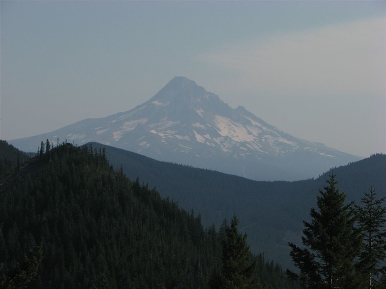 Mt. Hood viewed from a scree field just north of the Benson Plateau. Smoke from the Gnarl Ridge fire of 2008 clouds the view.