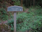 Trailhead sign for Ruckel Creek where the trail meets the Columbia State Highway Historic Trail.