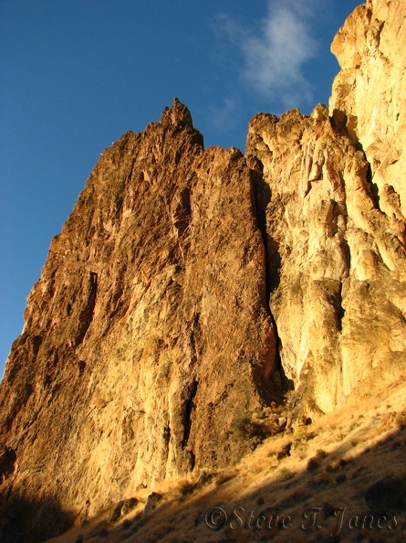 The roughness of this rock makes a fantastic interplay of light and shadows in the early morning sun at Smith Rock State Park.