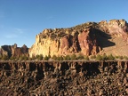 A great view showing the basalt base underlying Smith Rock State Parka and the browns and reds of the top layer of rocks that were formed from welded tuff and rhyolite rocks. The welded tuff was formed from ash that was melted together as it fell onto the