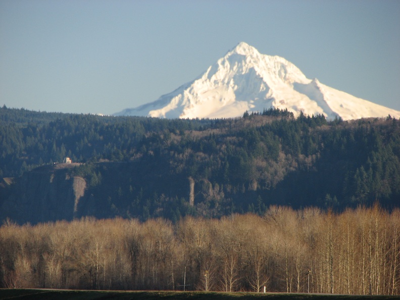 Travelling east, the trail uses an existing dike. Mt. Hood is partially eclipsed by the foothills to the southeast.