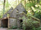 The stone house is at the junction of the Lower Macleay Trail and the Wildwood Trail. Though it is picturesque sometimes people leave trash around the house.