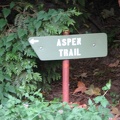 The Aspen Trail starts on Aspen Road and goes back up to the Wildwood Trail. Here is the trail sign but it is off in the bushes a bit.