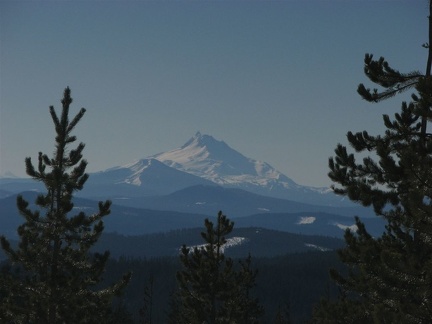 Mt. Hood blanketed in snow as seen from the promontory which is west of the Twin Lakes Trail. I was able to partially screen out one of the clear cuts by placing a tree to cover one of the clear cuts.