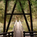 Cable and wood suspension bridge across Eagle Creek. This is looking back to the trailhead