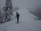 Jeremiah braving the wind and snow on the ridge leading to Barlow Butte.