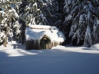 Someone has a cozy fire going in this little cabin by Summit sno park.