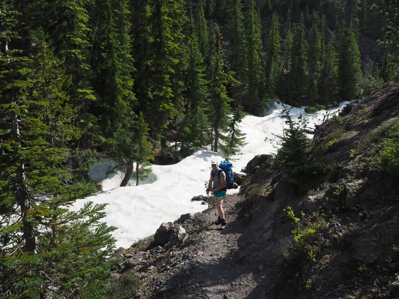 Heidi coming out of a snow-filled gully on the east side of the Loowit Trail.