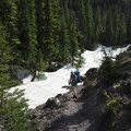 Heidi coming out of a snow-filled gully on the east side of the Loowit Trail.