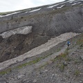 Heidi crosses one of many gullies carved out of the mountainside.