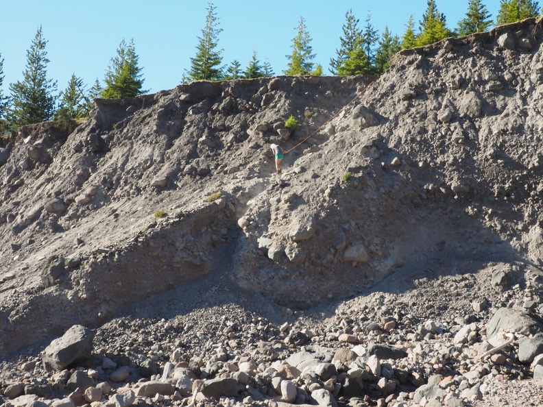 Heidi using the rope descent down to the floodplain of the Toutle.